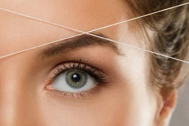Eyebrow threading treatment at Meena Threading and Waxing Center