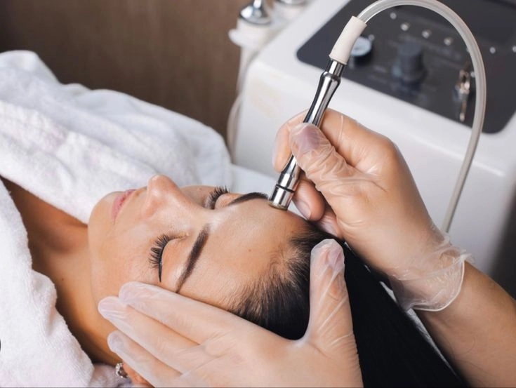 Diamond microdermabrasion facial care treatment at Meena Threading & Waxing Center in NYC