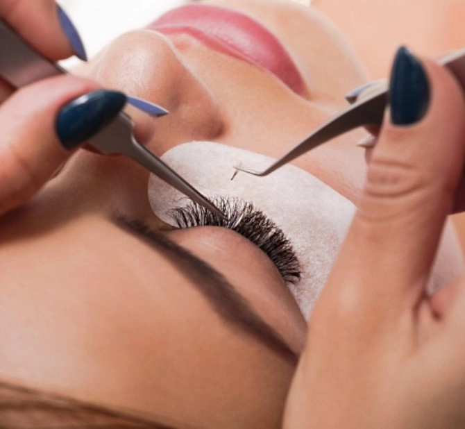 Eyelash extension isolation tweezers used for precise lash placement and retention