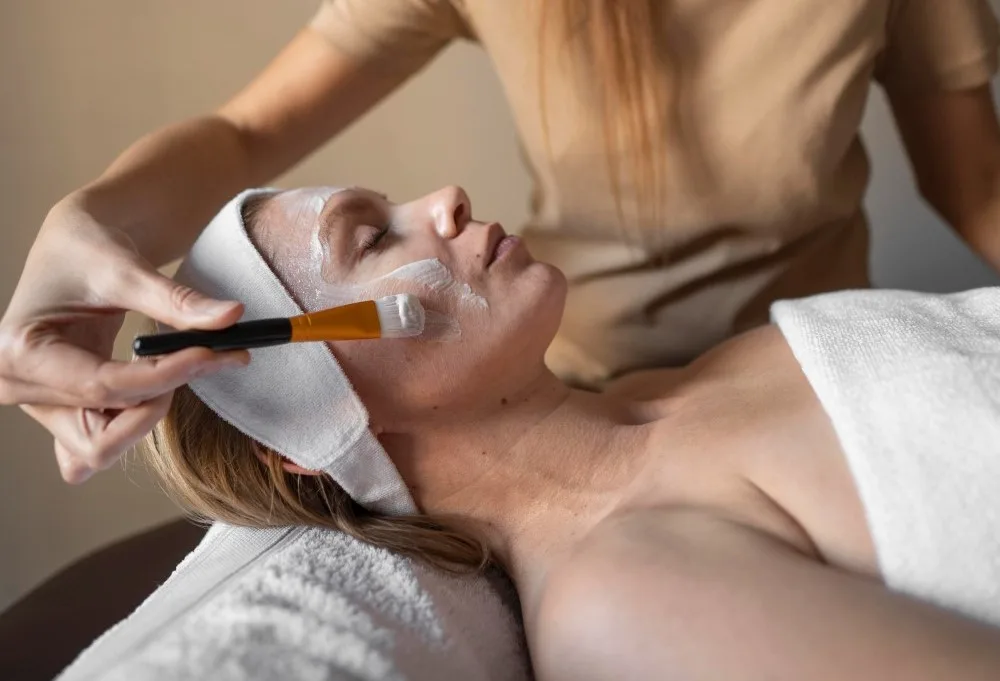 Organic facial treatment being applied