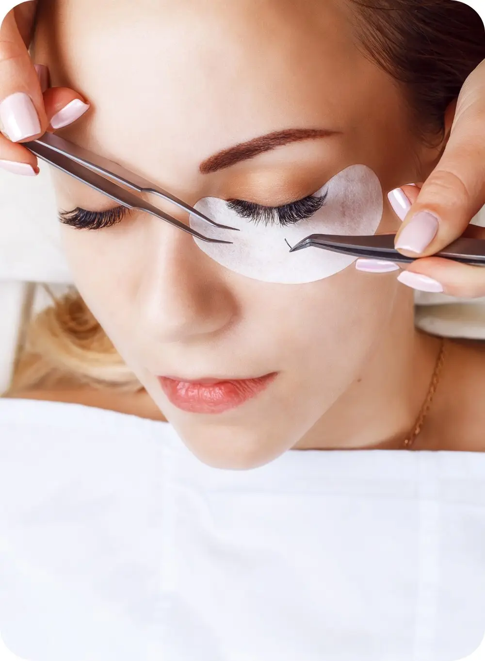 Two happy women embracing smooth, confident skin after waxing treatments